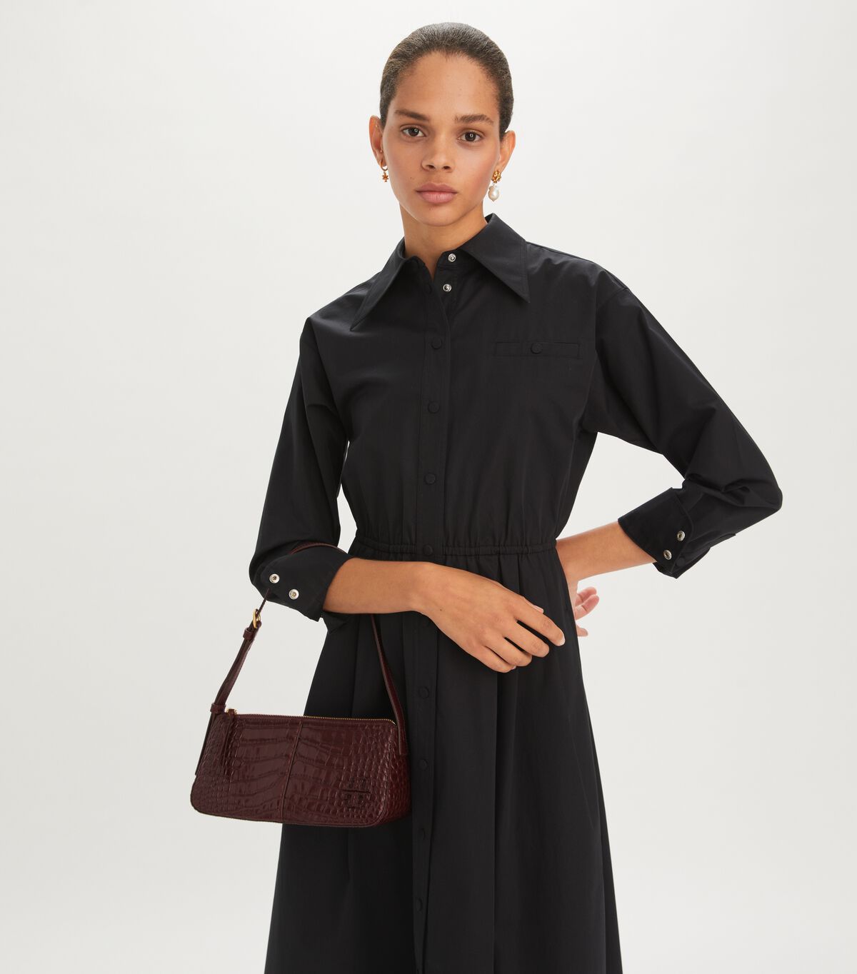 tory burch mcgraw embossed wedge bag