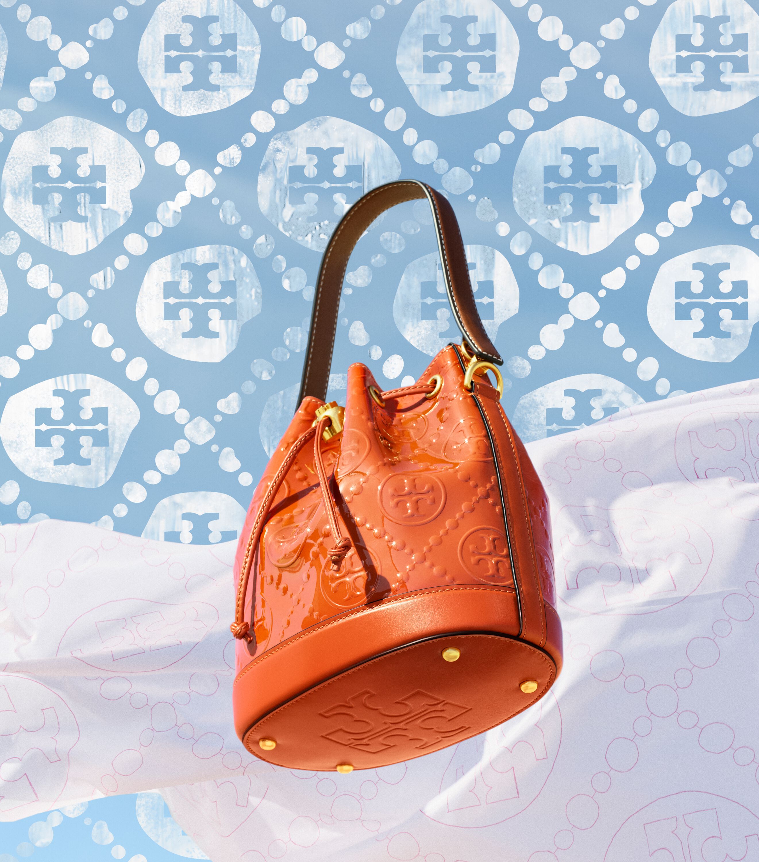 T Monogram Patent Embossed Bucket Bag, Spring Spice | Tory