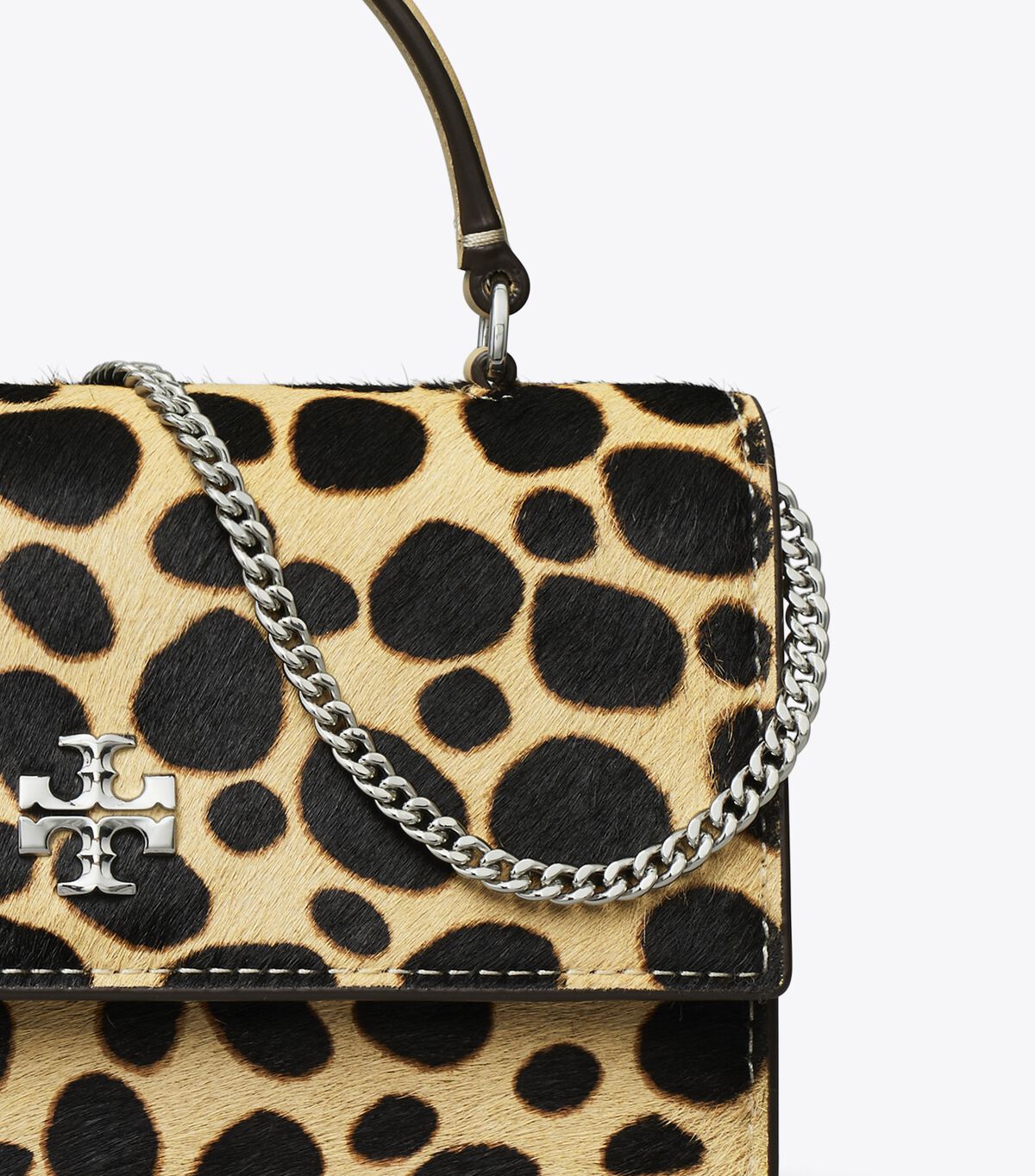 حقيبة كروس ميني كيرا بمقبض علوي من شعر العجل tory burch حقيبة كروس ميني كيرا بمقبض علوي من شعر العجل