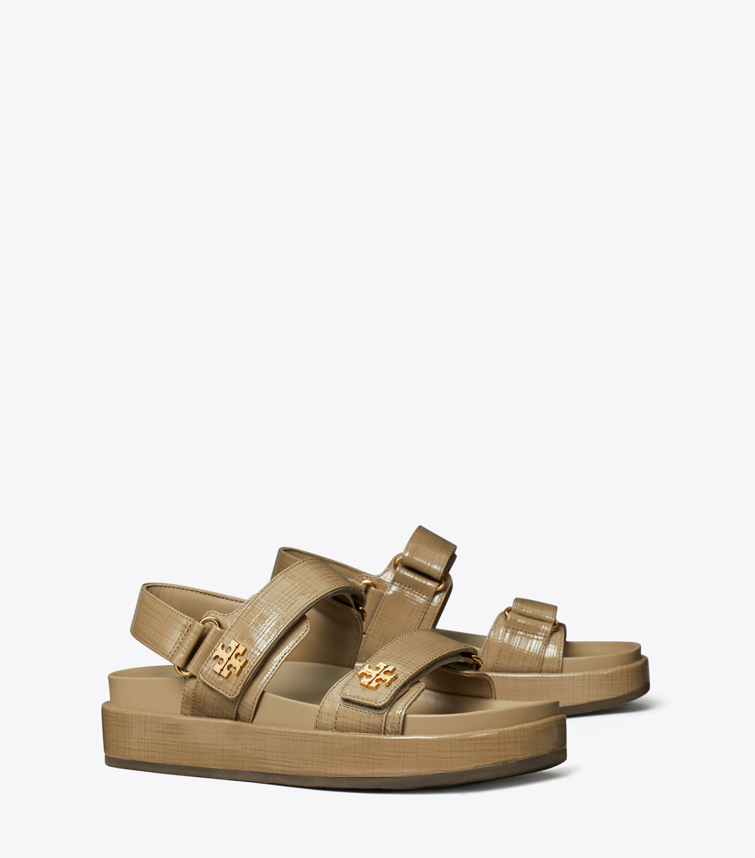 Tory burch gold wedges discount