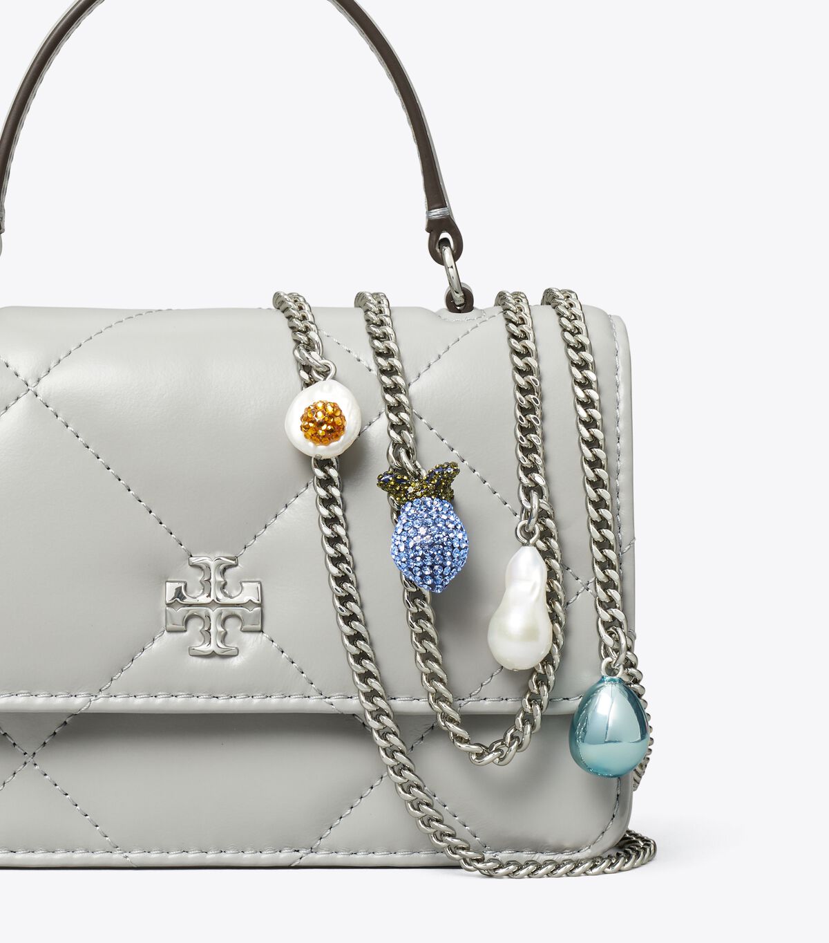 tory burch mini kira diamond quilt charm top handle crossbody