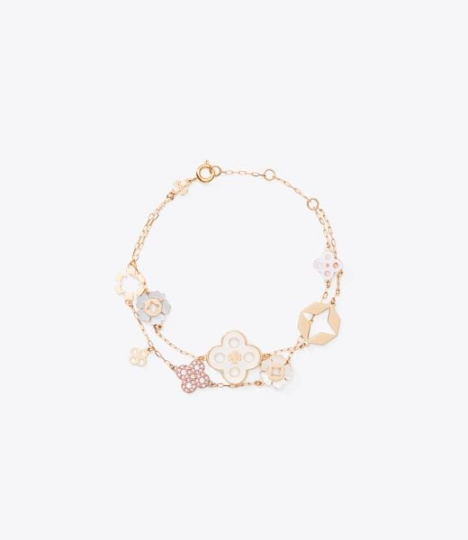 tory burch أقراط خطية بزهرة البرسيم