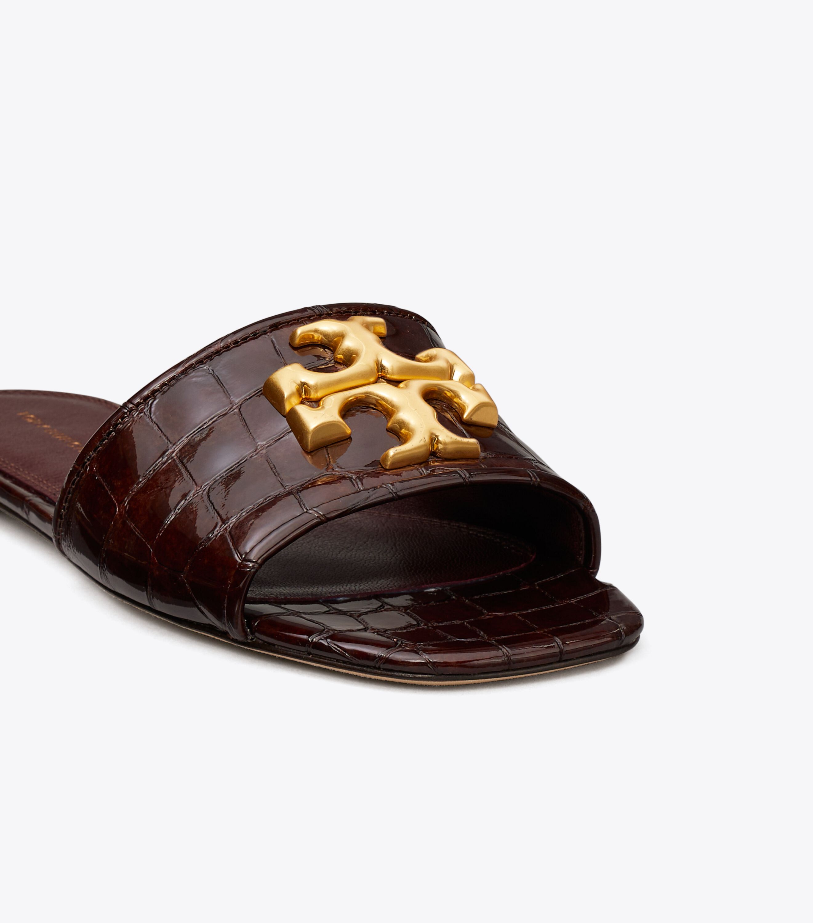 Tory burch logo slides top