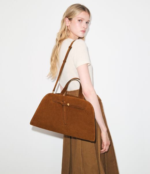 حقيبة رومي الشامواه بتصميم باوليتو tory burch حقيبة رومي الشامواه بتصميم باوليتو